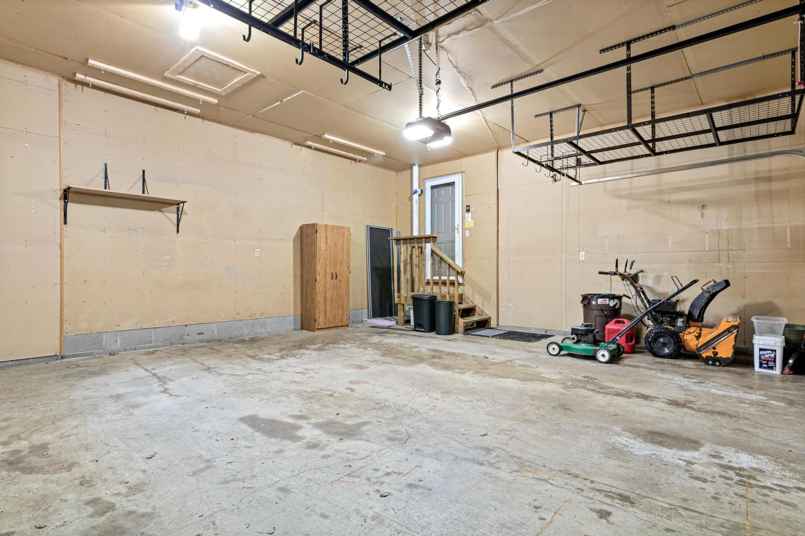 Nice sized 2 stall garage has overhead storage