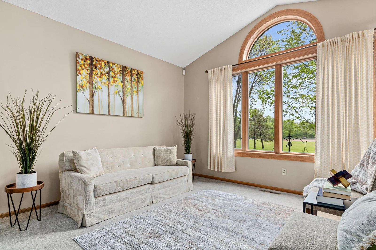 Spacious front sitting room with beautiful views overlooking the perennial flower garden