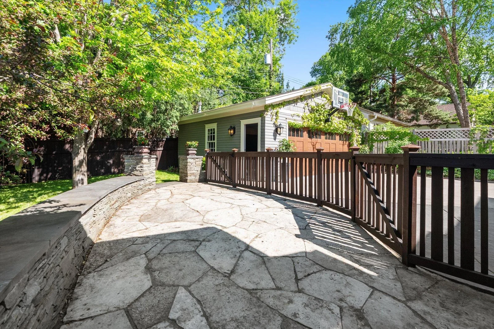 English Stone patio and retaining wall.