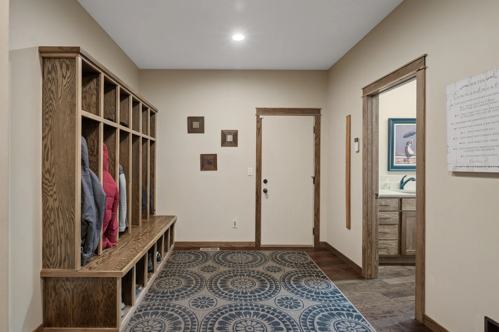 Space and storage galore in your huge mudroom! Plenty of room for everyone's coats, snow gear, backpacks, and more in your built-in storage lockers.