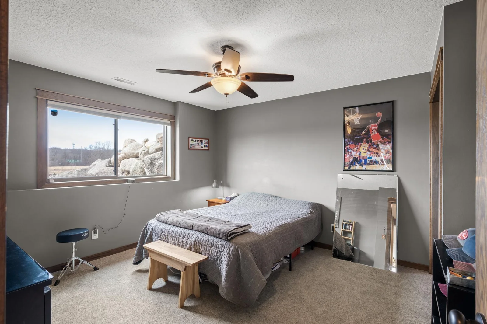 One of two lower level bedrooms. The oversized window lets in tons of light, so you don't even feel like you are on the lower level.