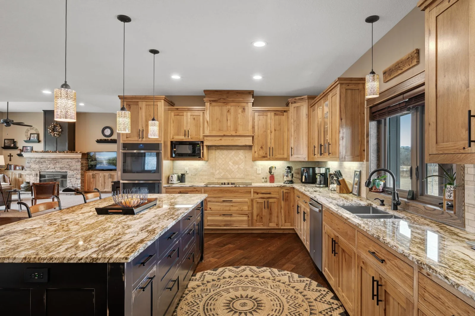 Your gleaming granite countertops give you so much space for food prep or serving a big meal for the whole group.