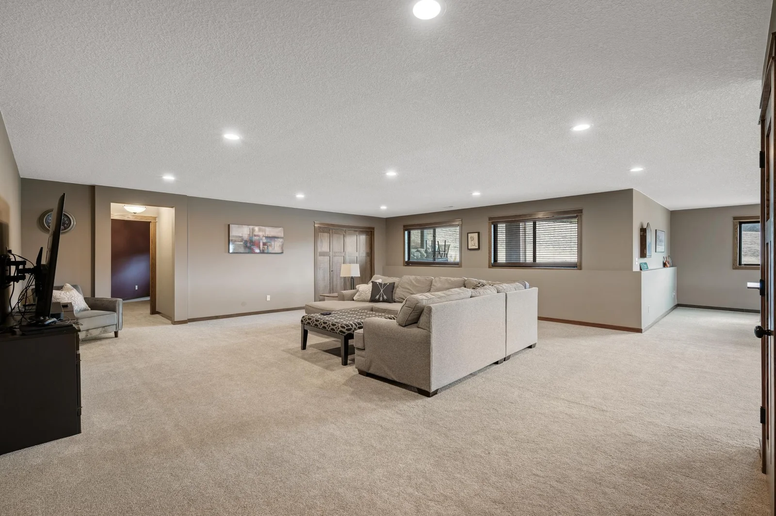 The in-floor heat on the lower level will helps keep your toes warm on cold winter nights, making this big space feel nice and cozy!