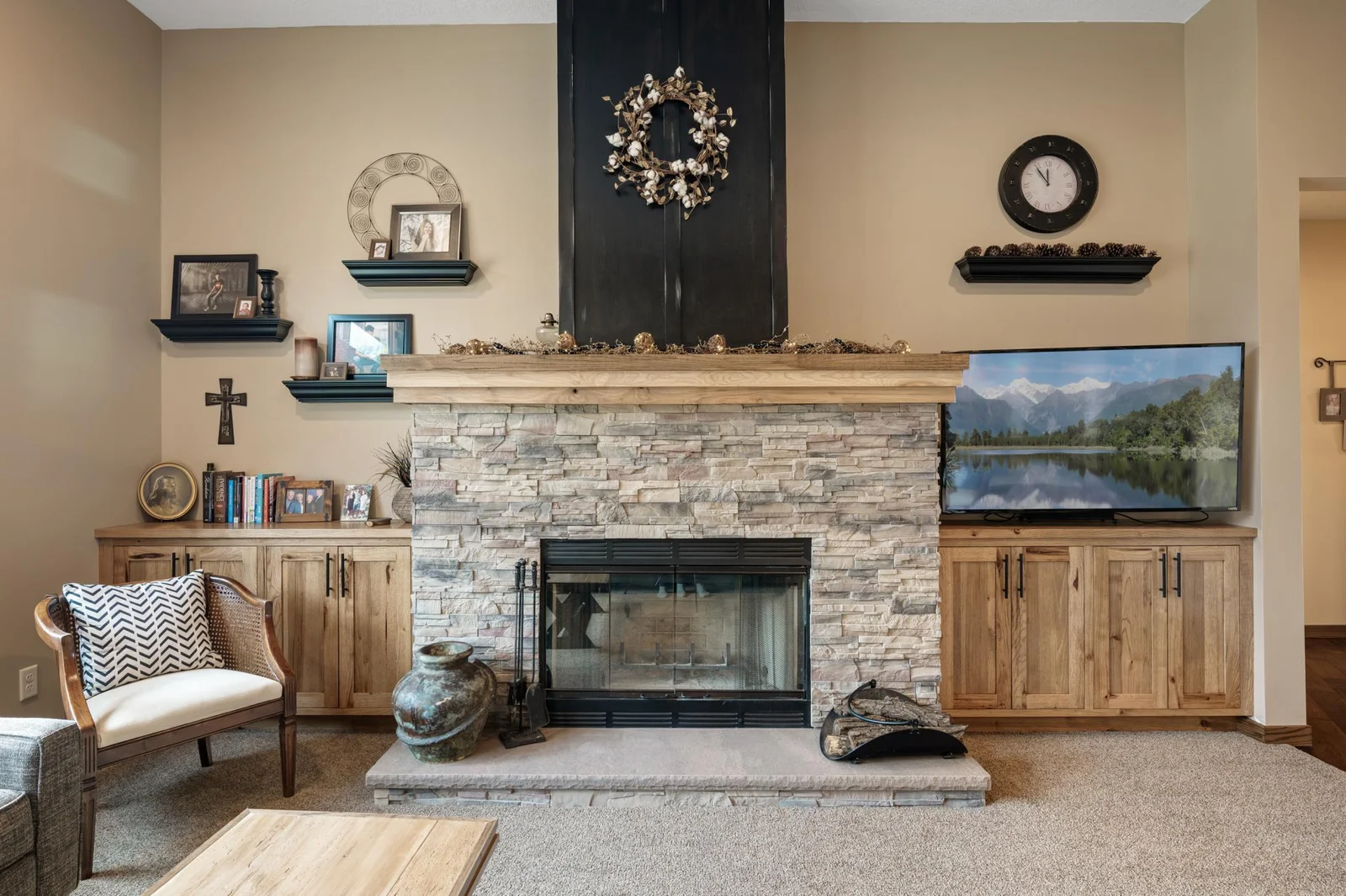 Get ready to take in the authentic sights and sounds from your wood burning fireplace. This custom built chimney, mantle, and built-in hickory cabinets steal the show in this space!