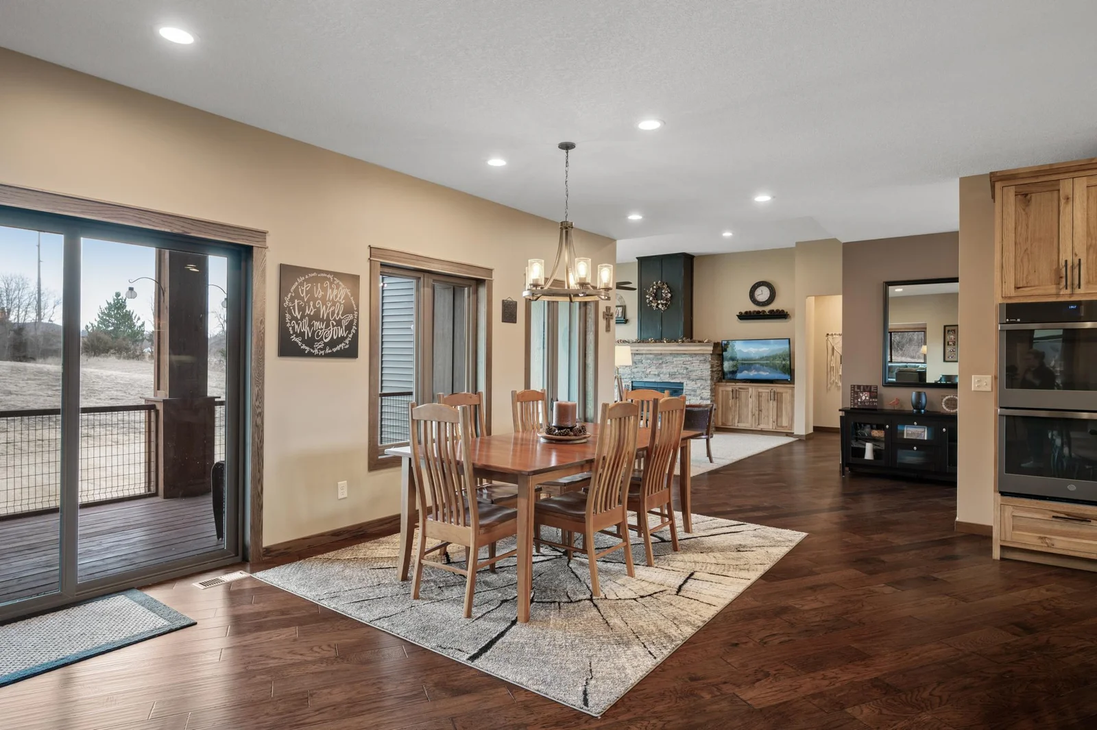 You will love the incredibly easy access off your dining room to your covered back porch! A great spot for enjoying a meal or drink in the summer.