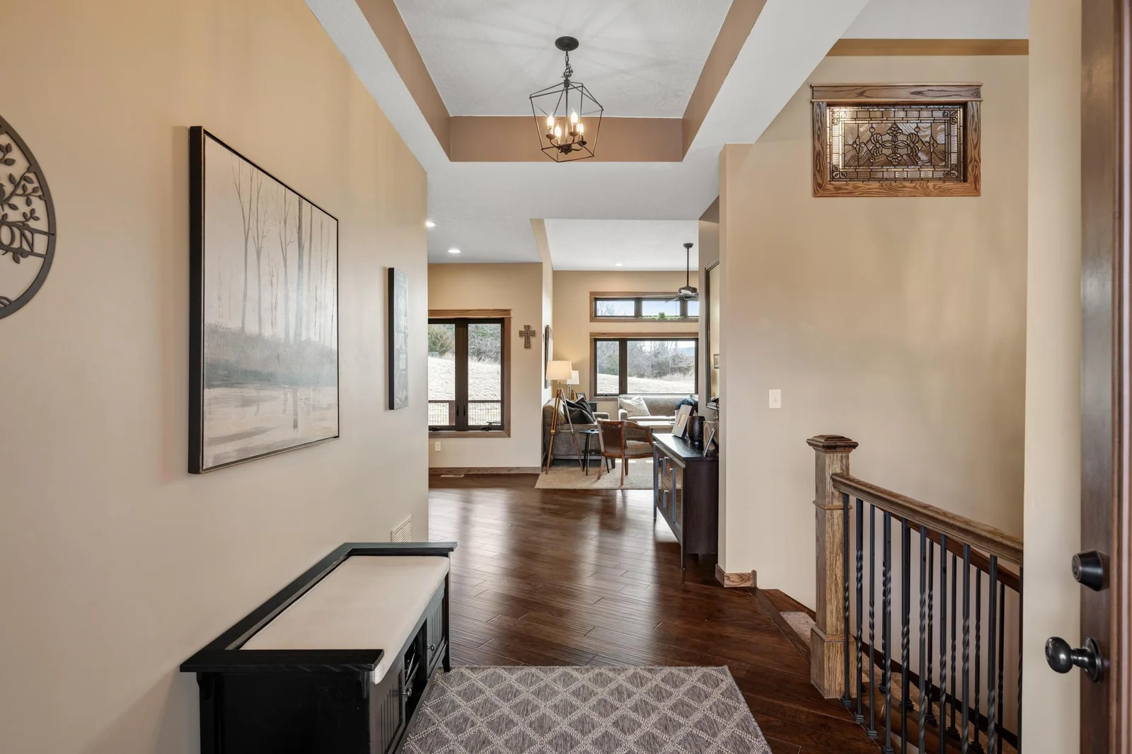 Step inside to discover elegance and comfort at every turn, from the elegant box vault ceiling in the foyer, to the custom trim accents and features throughout!