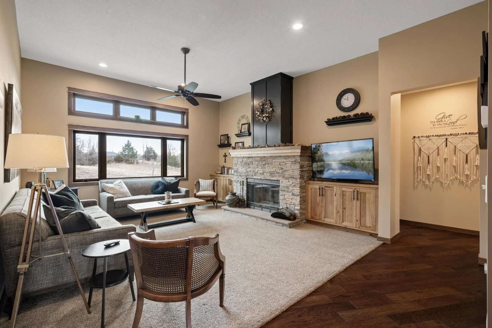 The elevated ceilings and oversized panoramic windows in the great room make it feel even more spacious than it already is!