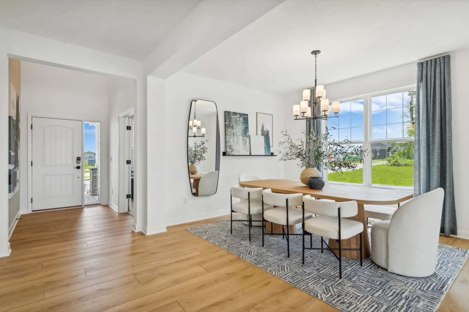Photo is of the actual model. Make the best first impression with this bright and open foyer.