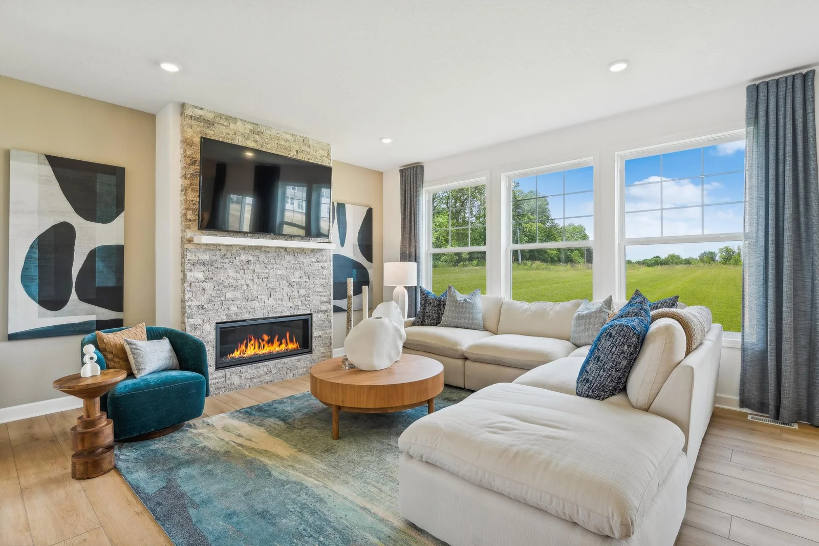 Photo is of the actual model. Cozy up next to the fireplace!