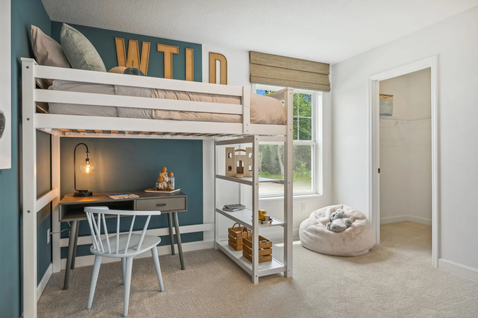 Photo is of the actual model. The third generously sized upper level secondary bedroom with a spacious closet.