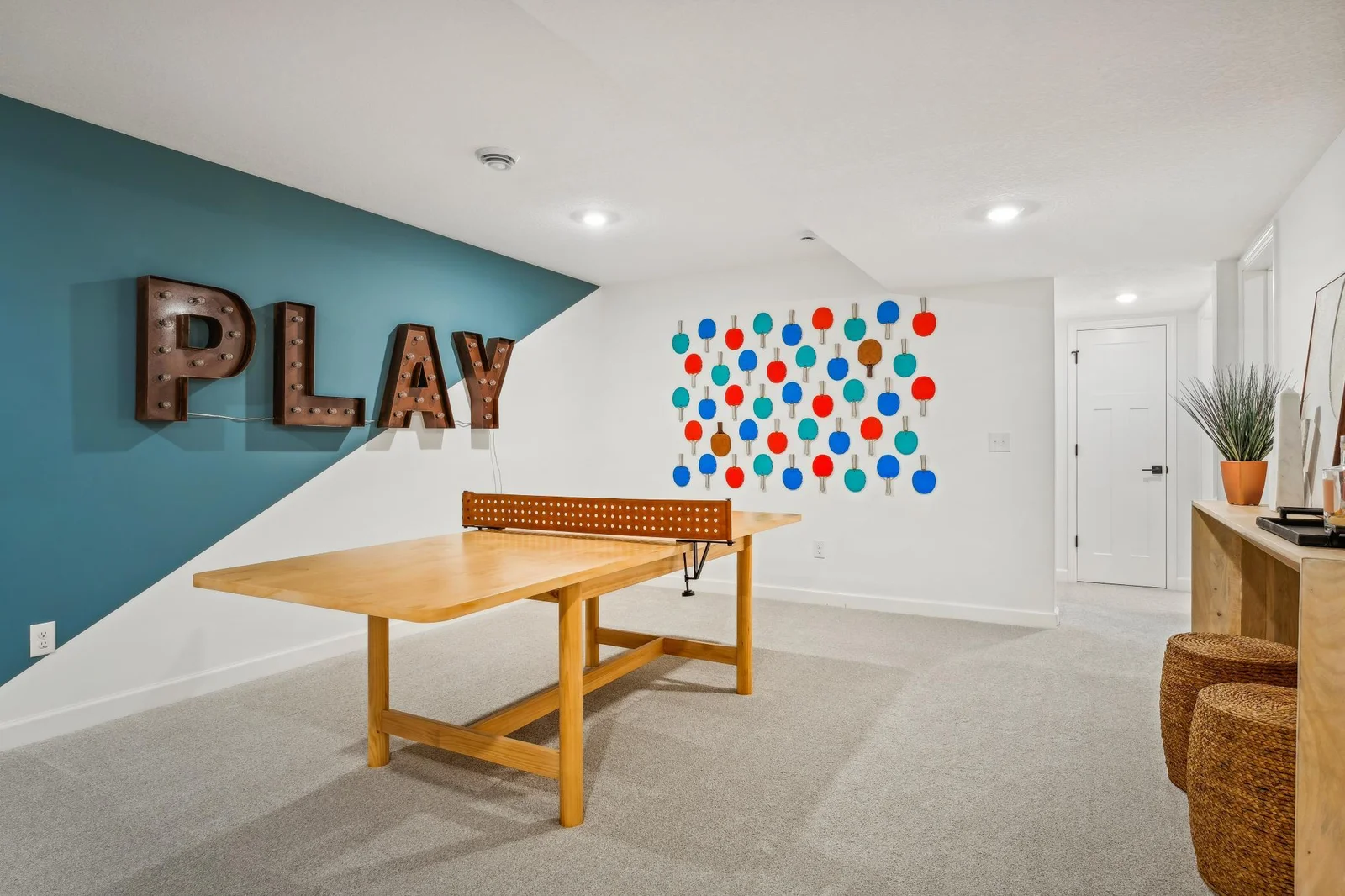 Photo is of the actual model. The game room.