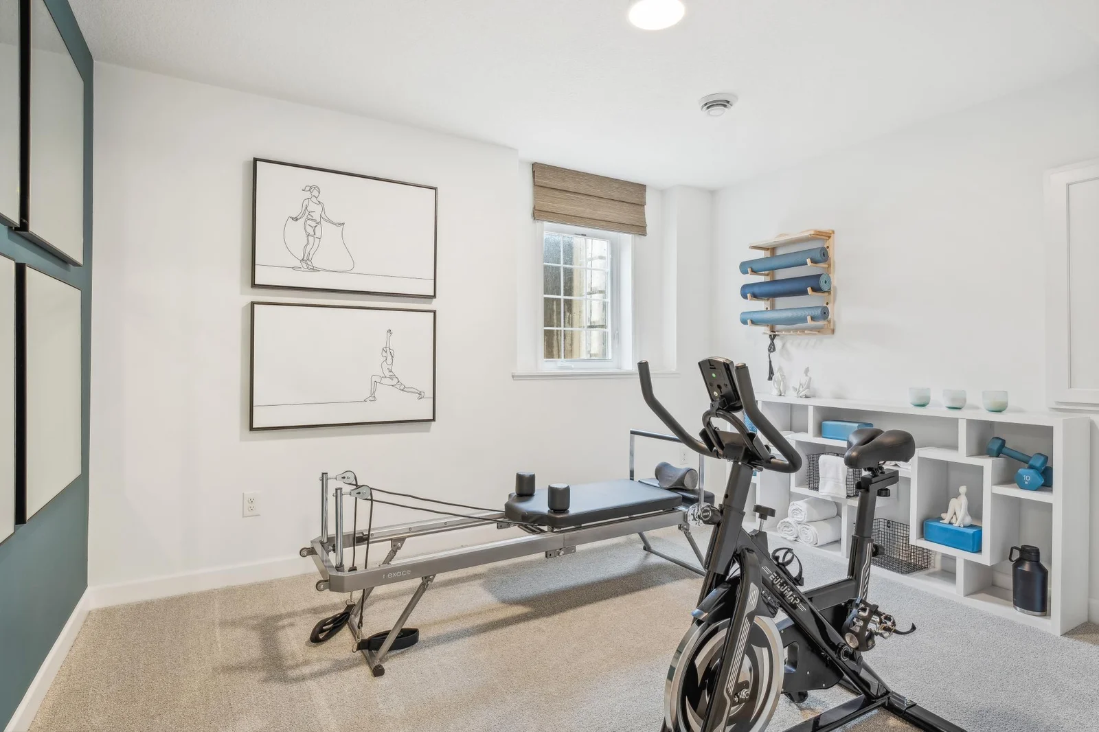 Photo is of the actual model. The 6th bedroom which can be used as a workout room as seen here!