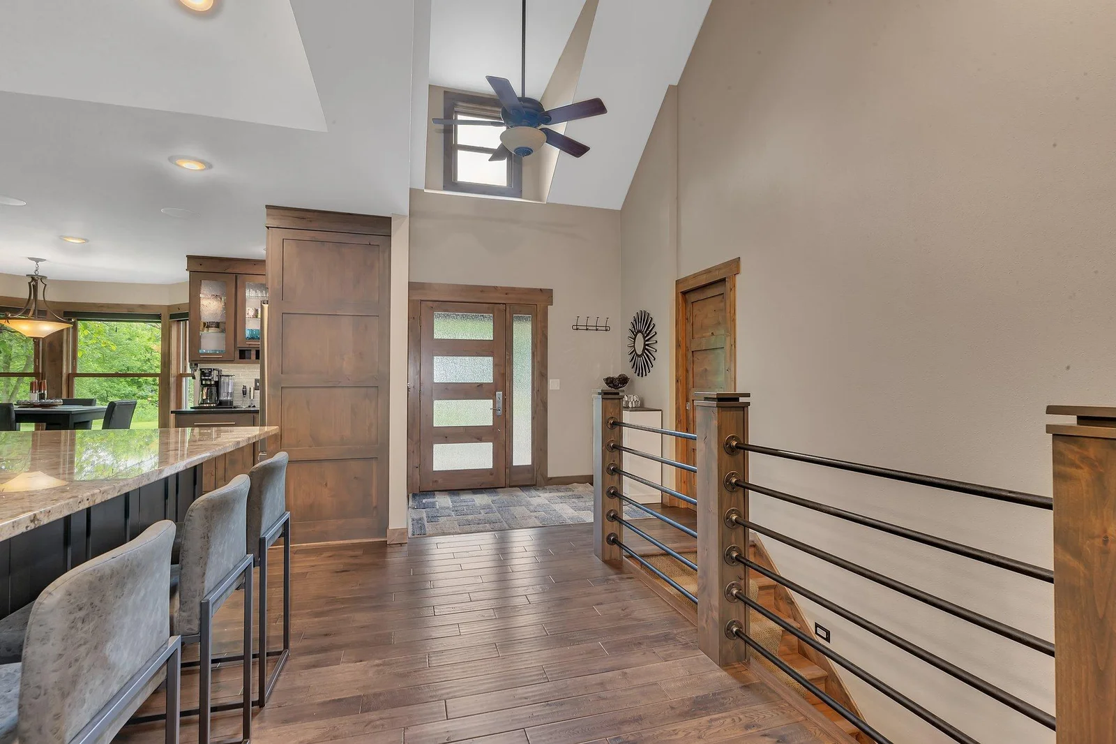 Welcoming entryway offers stunning views of the lake the moment you walk in.