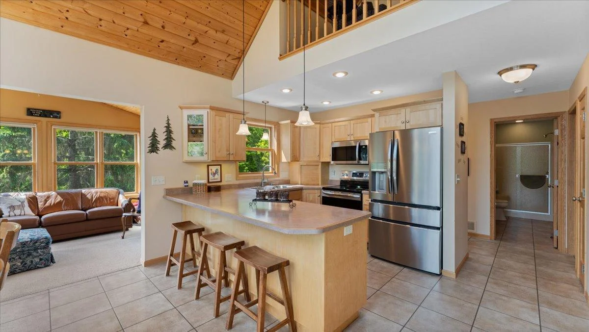 4132 Omaha Lane NW, Alexandria, MN 56308  Spacious kitchen with stainless steel appliances, and maple cabinets