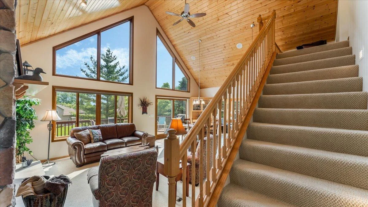 4132 Omaha Lane NW, Alexandria, MN 56308 The stairs leading to the 2nd floor area and bedrooms plus a full bathroom