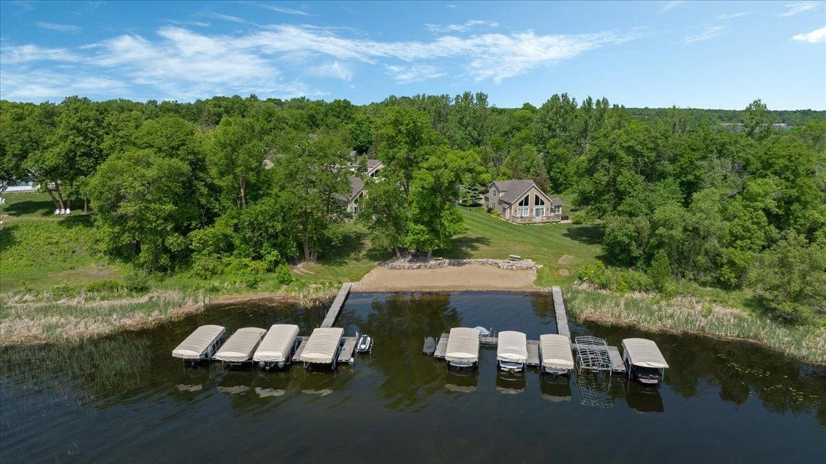 4132 Omaha Lane NW, Alexandria, MN 56308 Beautiful elevation to the lake, sugar sand beach, well maintained marina area