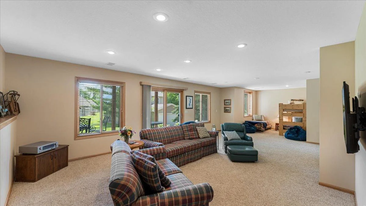 4132 Omaha Lane NW, Alexandria, MN 56308 Lower-level rec room with 1 more bedroom and walks out to the patio area.