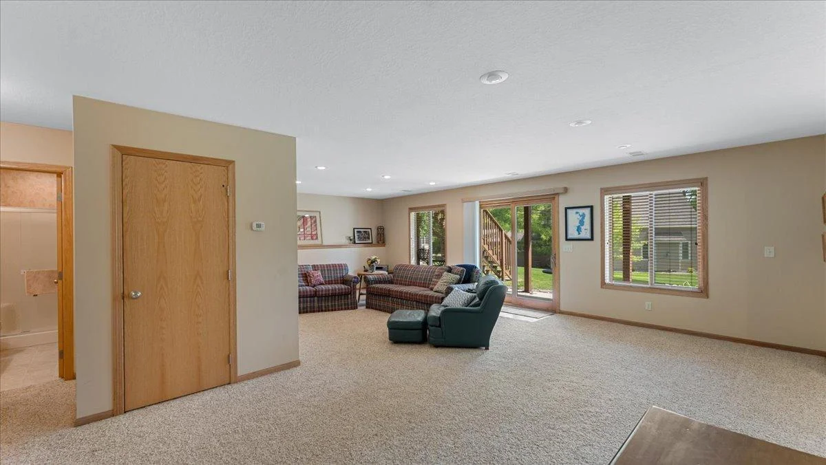 4132 Omaha Lane NW, Alexandria, MN 56308 Lower-level rec room with 1 more bedroom and walks out to the patio area.