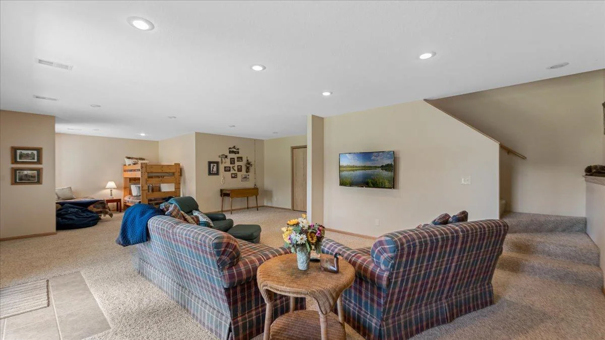 4132 Omaha Lane NW, Alexandria, MN 56308 Lower-level rec room with 1 more bedroom and walks out to the patio area.