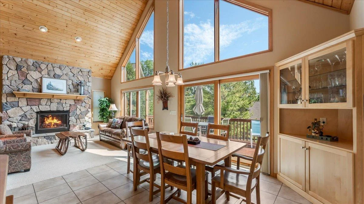 4132 Omaha Lane NW, Alexandria, MN 56308 The dining room opens to the lakeside deck