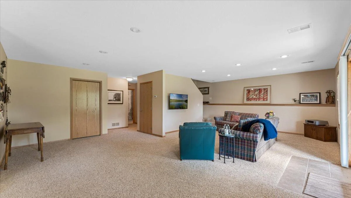 4132 Omaha Lane NW, Alexandria, MN 56308 Lower-level rec room with 1 more bedroom and walks out to the patio area.