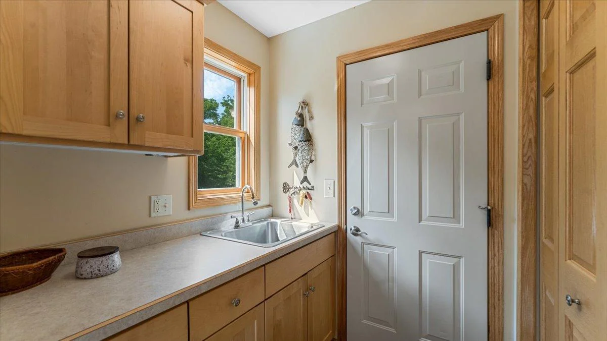 4132 Omaha Lane NW, Alexandria, MN 56308 Utility sink and extra workspace plus storage