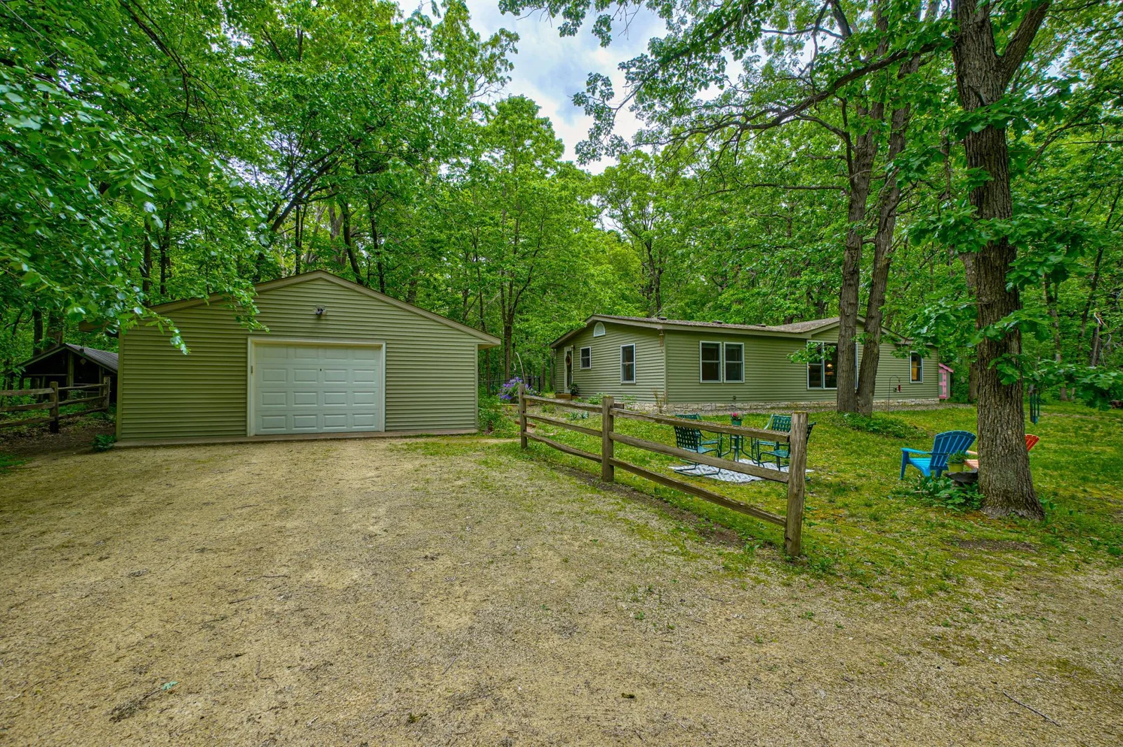 Complete with a spacious 24' x 24' two-stall garage, offering plenty of room for vehicles, storage, or workshop space