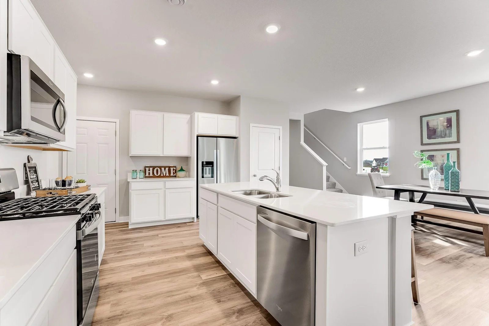 The Kitchen of is well lit & spacious. *Photos are of a previously staged model....