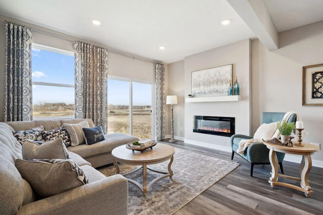 Cozy up and enjoy the fireplace and a show, or the view!  * Photo of a previously completed and staged model.