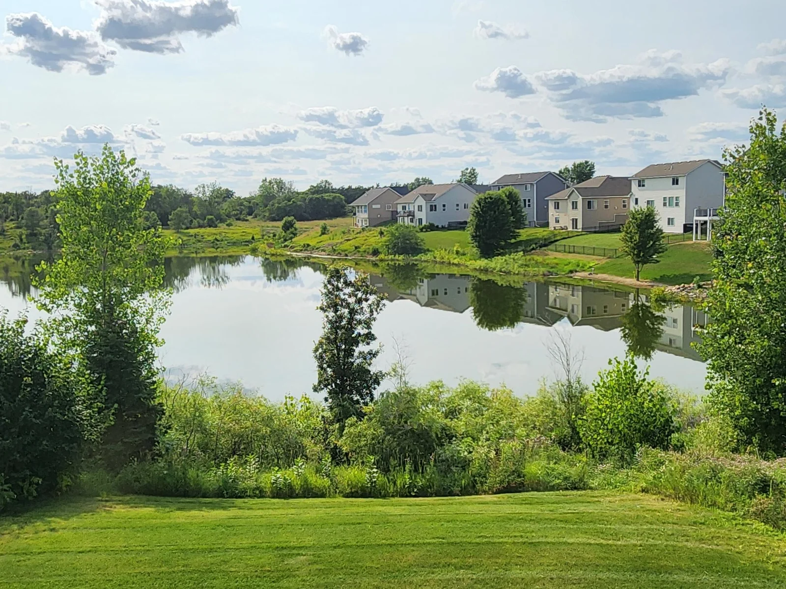 You'll love this view from your new living room - this picture is taken from the former model home next door with a similar view.