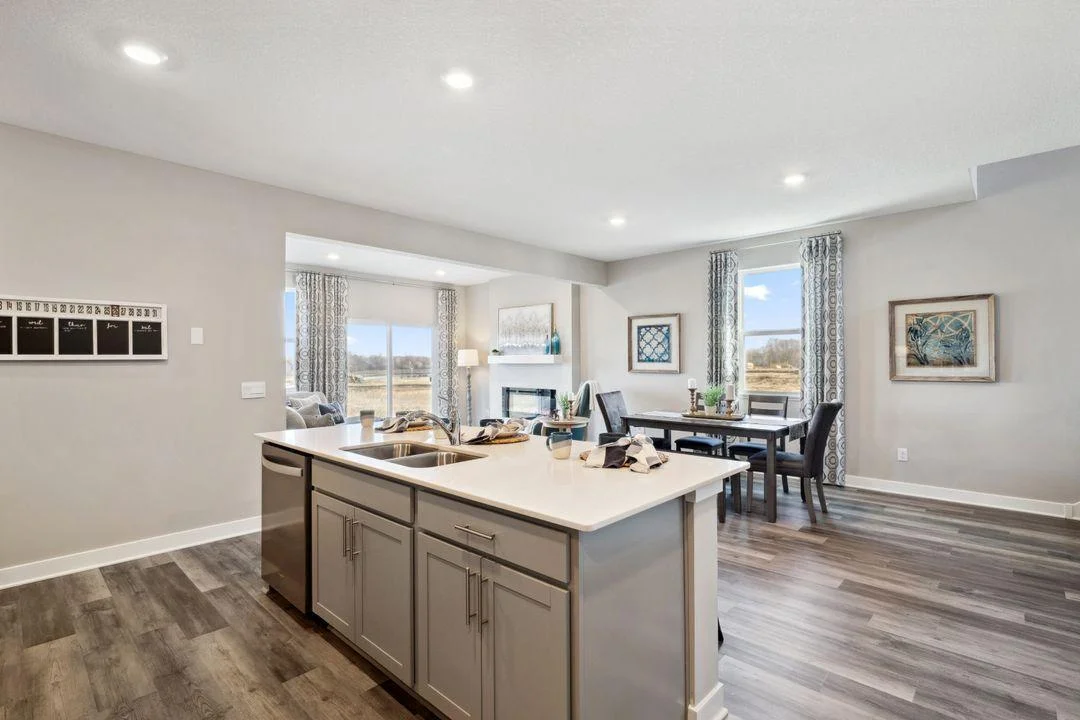 Enjoy the open concept in this well lit & spacious main level. *Photos are of a previously staged model....