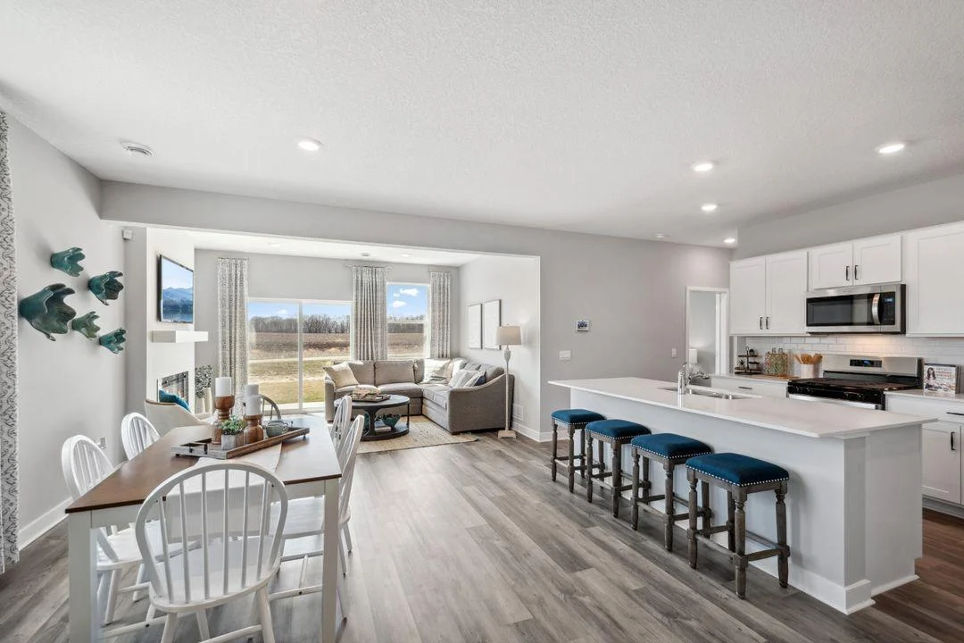 Enjoy the open concept in this well lit & spacious main level. *Photos are of a previously staged model....