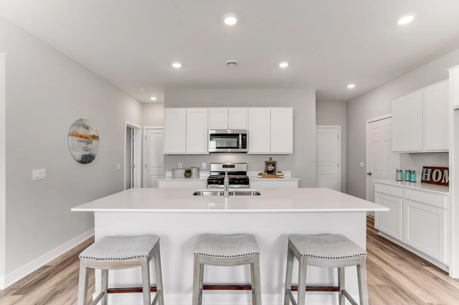A spacious kitchen island for the family to gather around during informal meals....