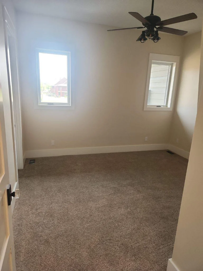 The high ceilings and natural light continue throughout both of the additional bedrooms on the main level.