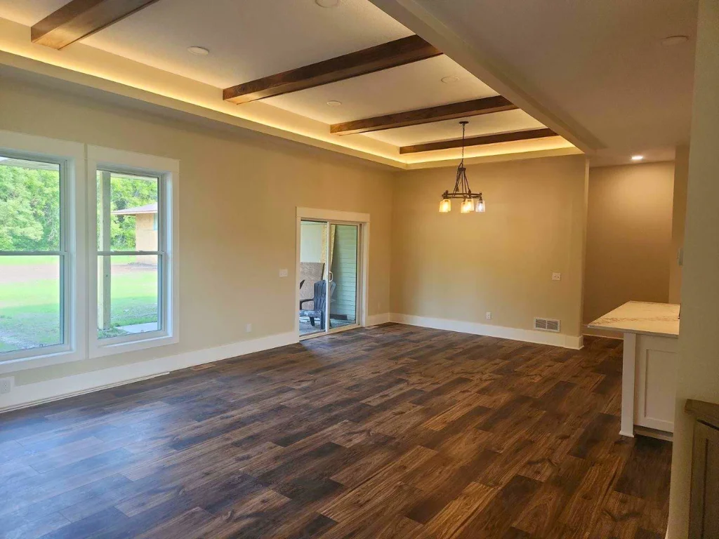 Black Walnut accent beams add depth and character to this large open concept living space! And don't miss the convenient and easy access to your patio right off of the dinning area.