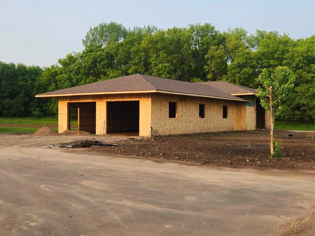 The ultimate hang out cave or workspace — a 3,000 sq ft detached building with 100 amp service, featuring two sections: 1,500 sq ft with 10’ ceilings and 1,500 sq ft with 12’ ceilings.