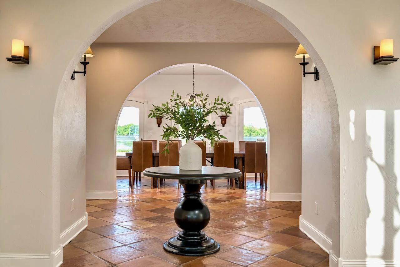 Marvel at this beautiful Spanish inspired terracotta tile throughout the foyer, dining and kitchen.
