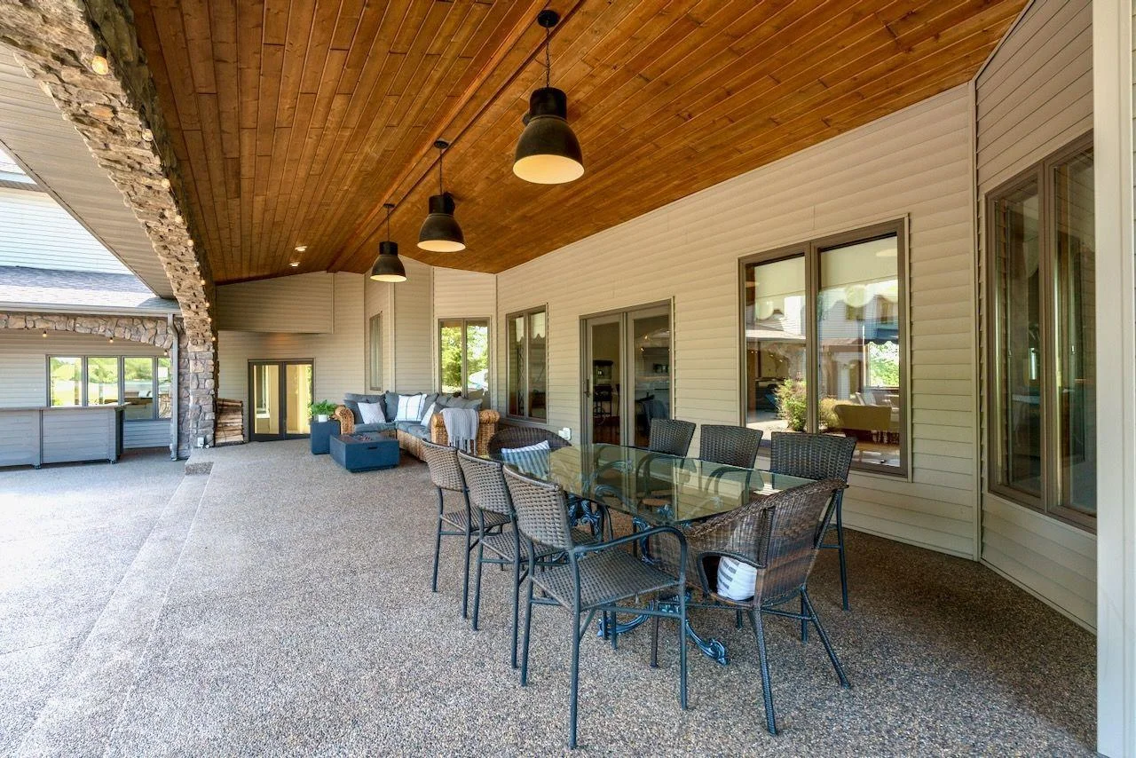 Beautiful stone archways, exposed aggregate concrete and wood ceilings
