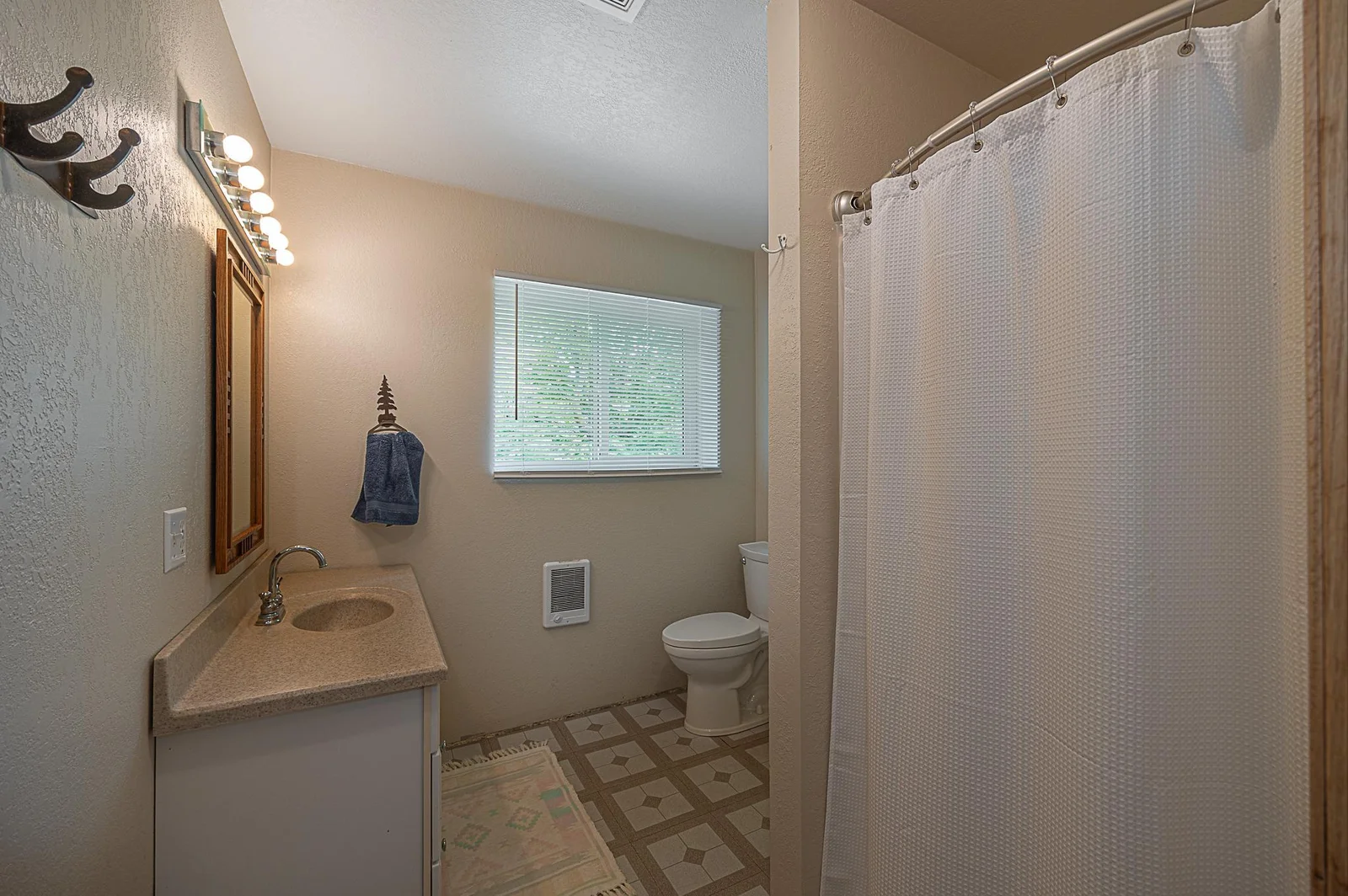 Bathroom one in garage.