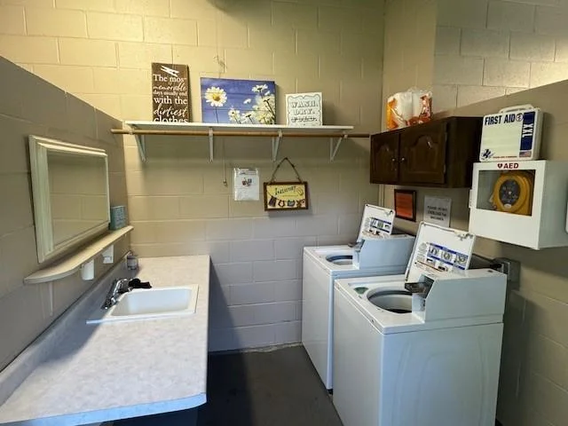 laundry has 2 washers and 2 dryers to be shared. nice folding area and sink.