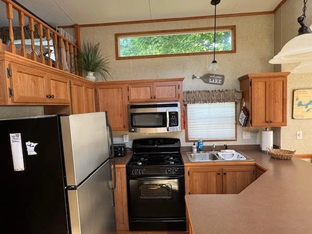 Breakfast Bar with All Appliances,Windows Micro Fan Hood & Cabinetry.