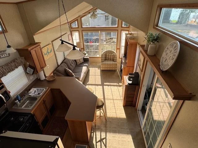 Over head view of living room and Kitchen.