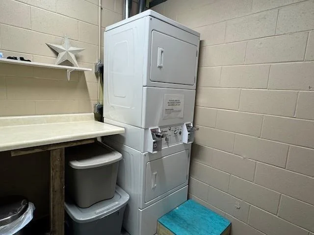 2 Stacking Dryers and another folding area.