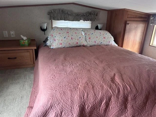 Large second bedroom on second level with Air Conditioning.