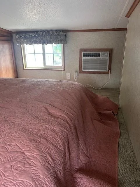 Second level Bedroom with window air