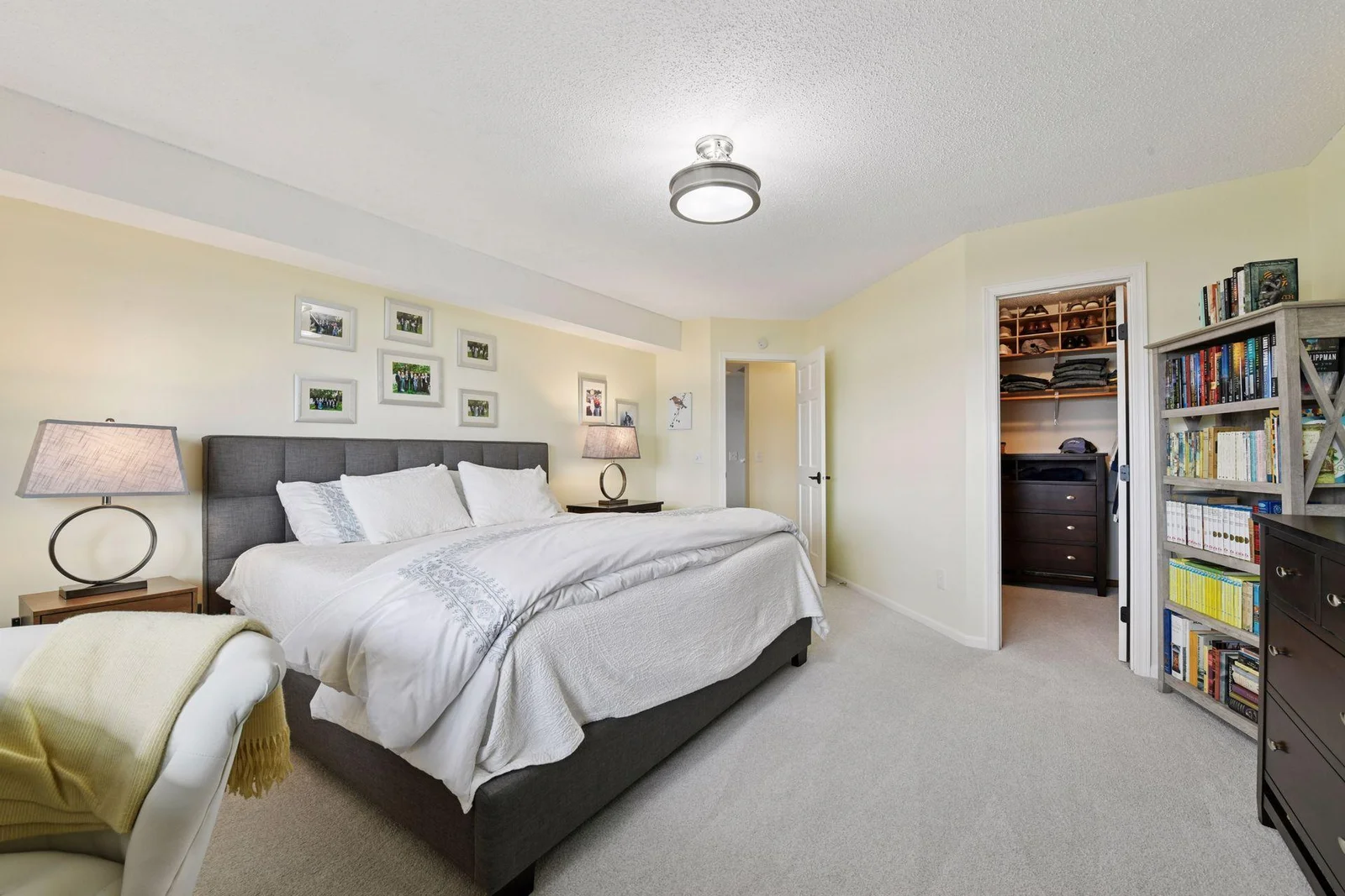 The second bedroom offers breathtaking water views, providing a stunning backdrop all year round plus a nice size walk in closet for storage.