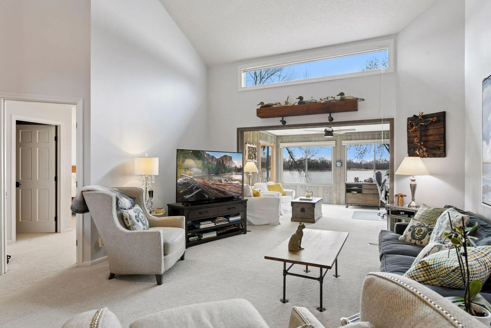 This townhome offers generous space on both levels, with lake views from nearly every room.
