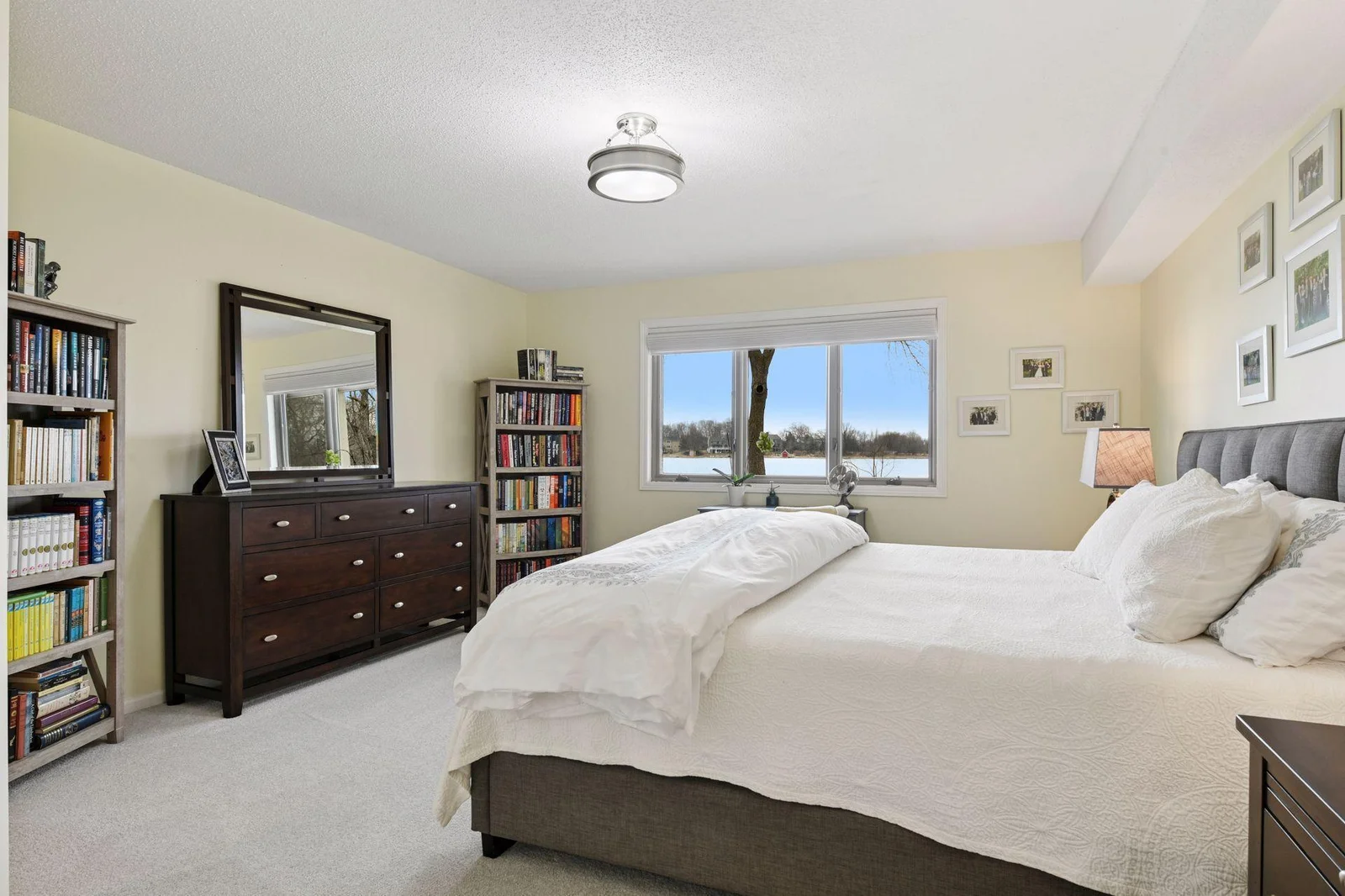 The second bedroom in generous in size and offers breathtaking water views, providing a stunning backdrop all year round.