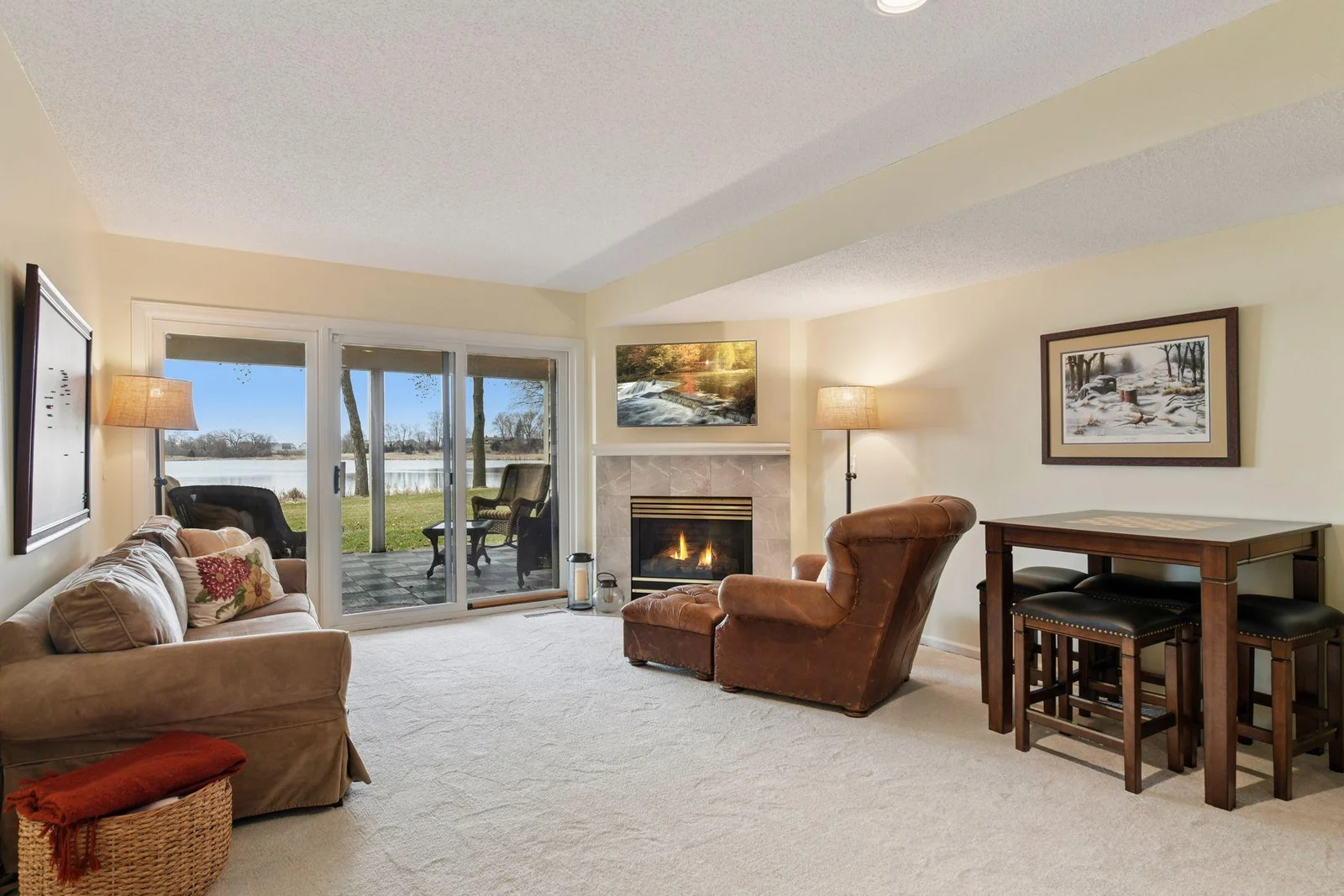 Step into the lower level where you can walk out to the patio for fresh air or curl up by the cozy fireplace with a good book or your favorite show.