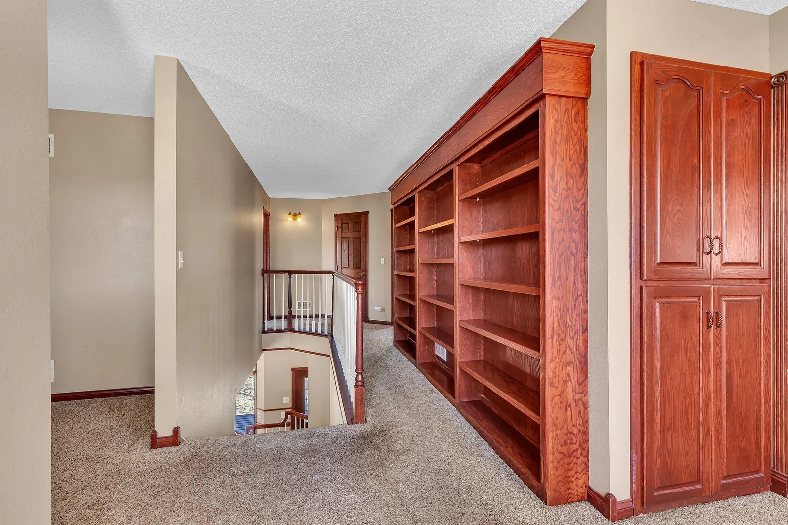 Upper level built in book shelfs